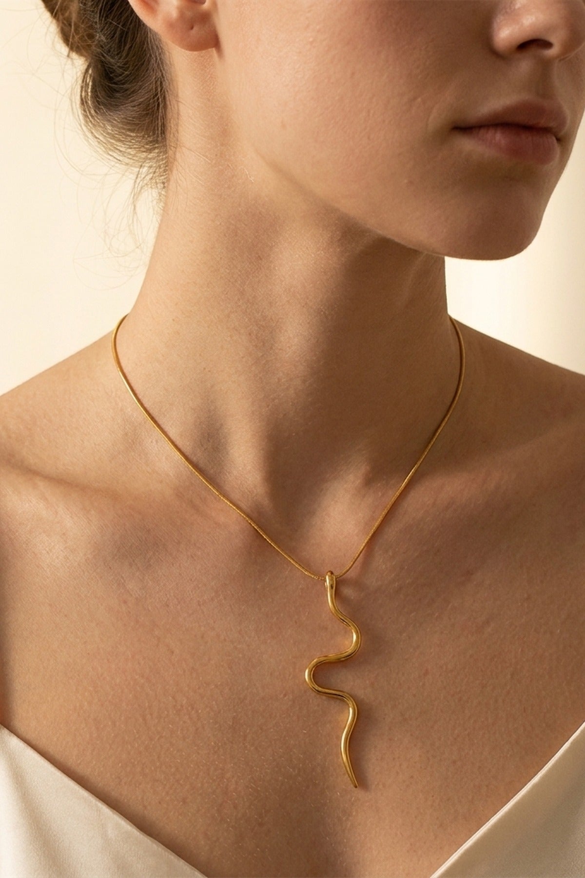 gold India Gold Tone Wavy Serpent Pendant