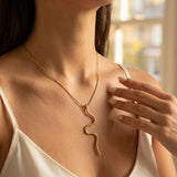 gold India Gold Tone Wavy Serpent Pendant