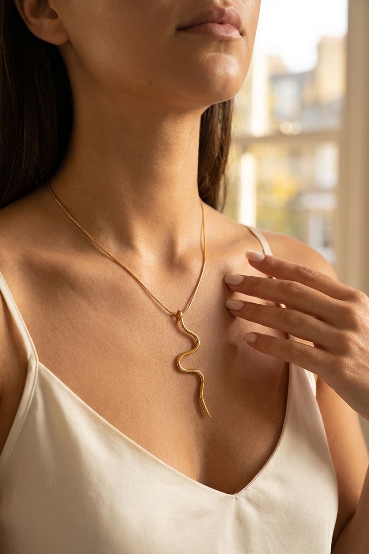 gold India Gold Tone Wavy Serpent Pendant