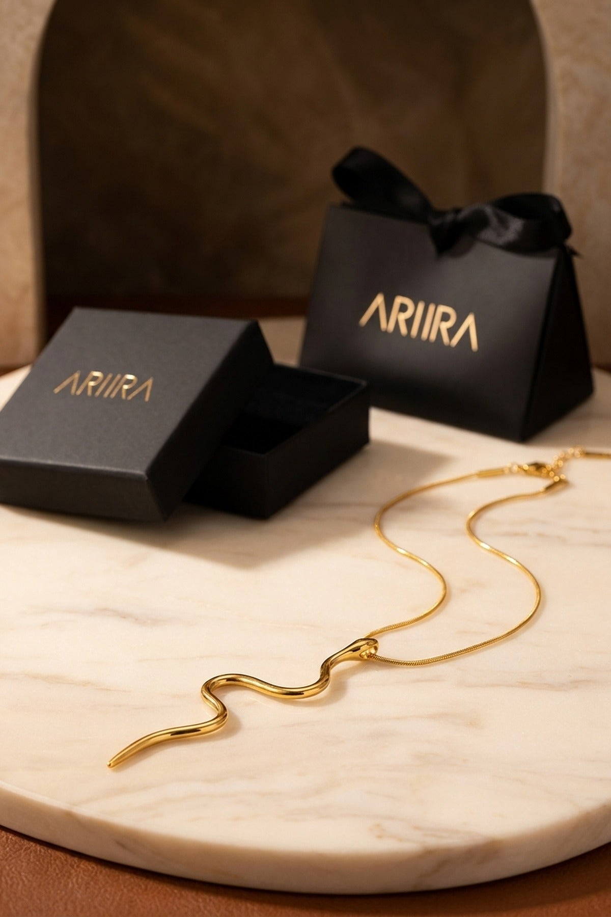gold India Gold Tone Wavy Serpent Pendant