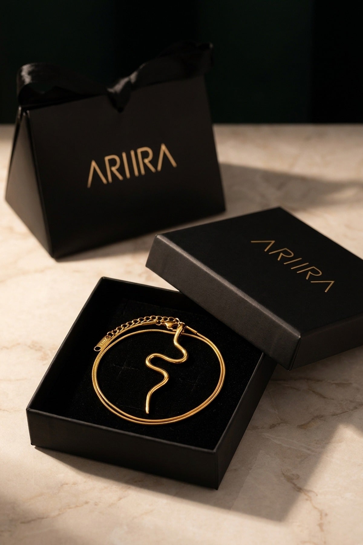 gold India Gold Tone Wavy Serpent Pendant