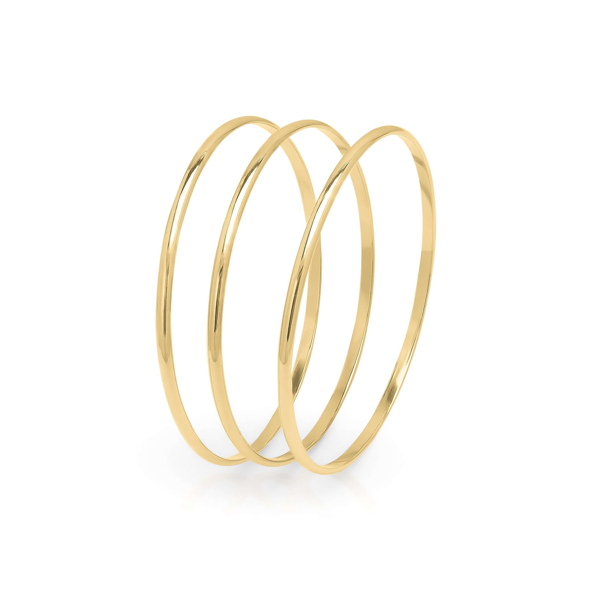 Mira set of three gold bangles by ARIIRA with sleek polished finish for elegant, versatile styling.