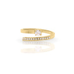 Talia Adjustable Crystal Accent Ring by ARIIRA, featuring a radiant crystal and light-catching stones in a gold band.