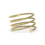 Zina Spiral Mesh Coil Bracelet by ARIIRA, featuring a textured mesh design and polished end spheres, effortlessly stylish.