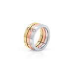 Kaia Triple Tone Crystal Ring Set by ARIIRA featuring stacked rose, gold, and silver bands with crystals.