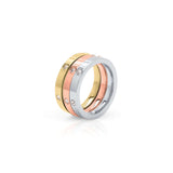 Kaia Triple Tone Crystal Ring Set by ARIIRA featuring stacked rose, gold, and silver bands with crystals.