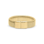 Yasira Ribbed Wide Gold Bangle Bracelet by ARIIRA, featuring a bold ribbed design and smooth clasp for elegant style.