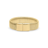 Yasira Ribbed Wide Gold Bangle Bracelet by ARIIRA, featuring a bold ribbed design and smooth clasp for elegant style.