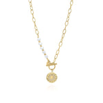 Mira Pearl Link Medallion Necklace by ARIIRA featuring freshwater pearls and a gold medallion charm.