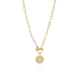 Mira Pearl Link Medallion Necklace by ARIIRA featuring freshwater pearls and a gold medallion charm.