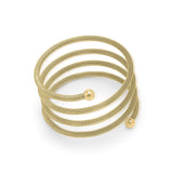 ARIIRA Zina Spiral Mesh Coil Bracelet in soft gold, featuring a textured finish and polished end spheres.