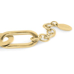 Close-up of the ARIIRA chunky link toggle chain necklace showcasing its bold design and circular clasp.