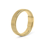 Yasira Ribbed Wide Gold Bangle Bracelet by ARIIRA, featuring a bold ribbed surface and smooth clasp closure.