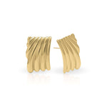 Freya Sculpted Wave Hoops by ARIIRA, gold earrings with ridged wave design reflecting light elegantly.