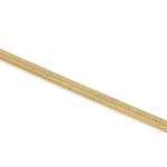 Layla Gold Herringbone Anklet from ARIIRA, gold-plated stainless steel, flexible weave for stylish summer wear.