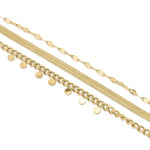 Siena Layered Gold Bracelet by ARIIRA with textured gold-plated chains and disc accents for elegance.