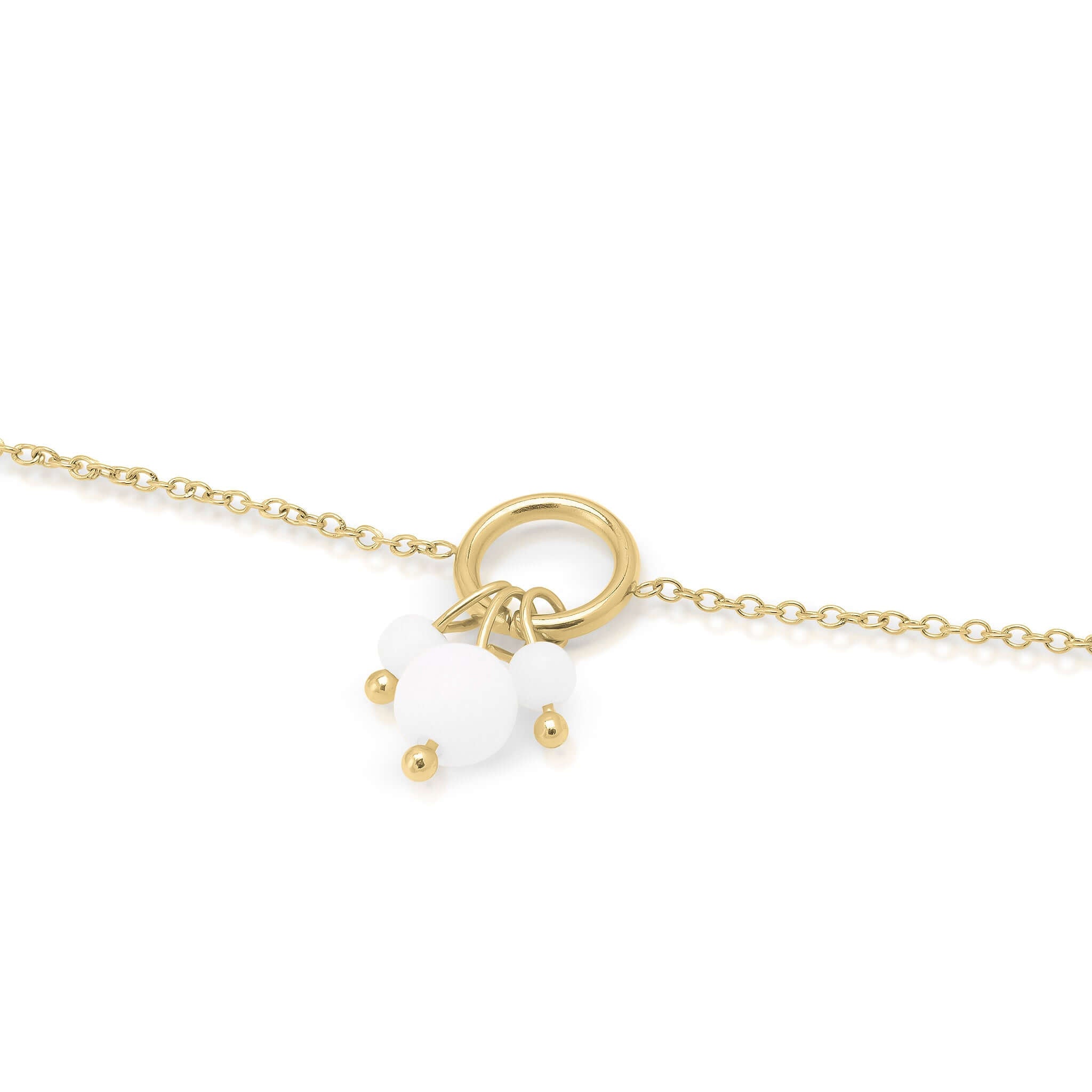 Close-up of the ARIIRA Freya Delicate Pearl Charm Bracelet featuring a gold-plated chain and elegant pearl-like beads.
