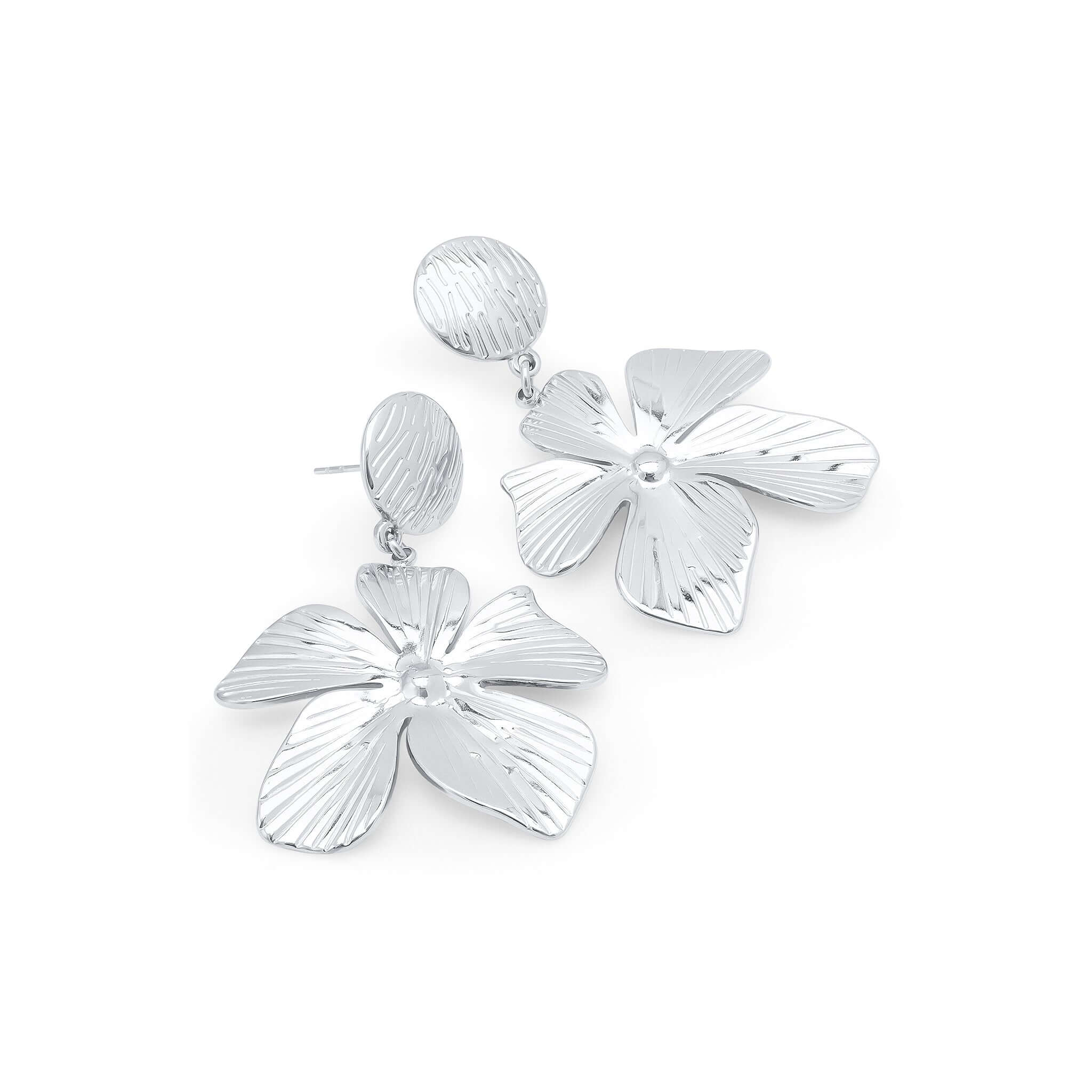 Malia Bloom statement earrings by ARIIRA, featuring silver petals with delicate textures for a bold yet lightweight look.