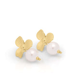Leila Pearl Flower Drop Earrings by ARIIRA featuring gold-plated floral design and elegant pearl drops.